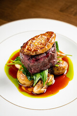 ribeye steak with potato and meat sauce