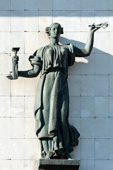 Naklejka premium Allegoric woman sculpture on the old building facade of The Artist’s House in Kyiv, Ukraine