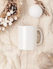 Assortment of Scandinavian style, cozy eco friendly, Handmade Christmas ornaments and gifts on light background, flat lay, top view with copy space