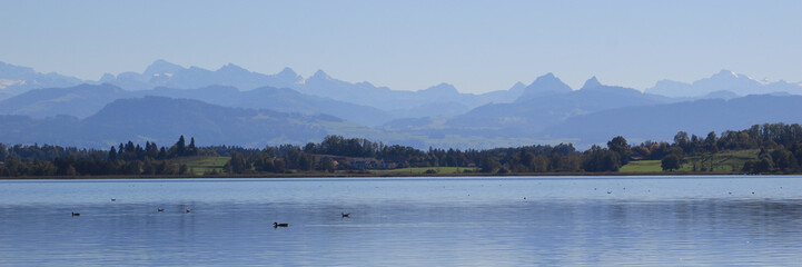 Lake Pfaeffikon and mountain ranges seen from Pfaeffikon, Switzerland.