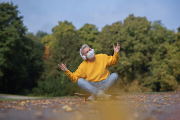 a woman with blonde short hair on a skateboard