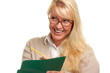 Shy Blonde Woman Looking Away as She Writes with a Pencil in Her Folder