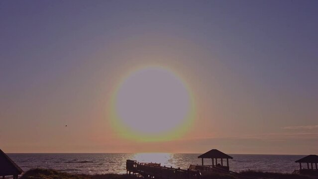 Time Lapse Of The Sun Rising From the Ocean