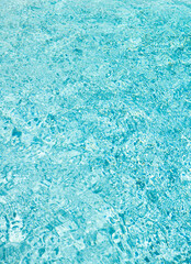 turquoise color background of swimming pool water with ripples in mediterranean