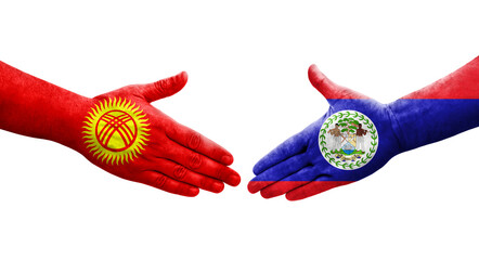 Handshake between Belize and Kyrgyzstan flags painted on hands, isolated transparent image.