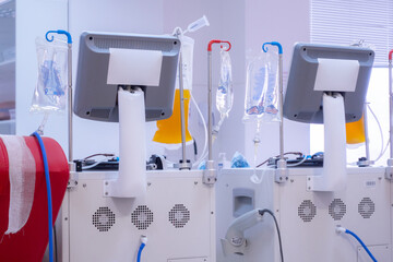Plasma donation devices with display stands at medical canter. Contribution. Healthcare. Professional. Medicine. Laboratory. Transfer. Needle. Volunteer. Test. Nursery. Lab. Therapy. Aid. Help
