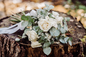 Obraz na płótnie Canvas bridal wedding bouquet white rose eucalyptus flowers 