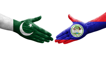 Handshake between Belize and Pakistan flags painted on hands, isolated transparent image.