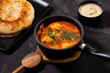 shakshuka on a dark background