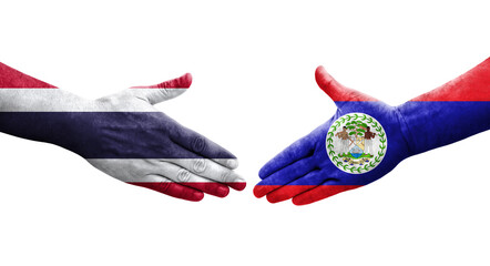 Handshake between Belize and Thailand flags painted on hands, isolated transparent image.