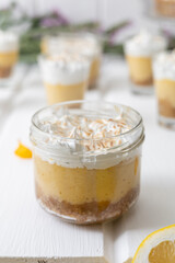 elegant decoration of glass cups with dessert of coffee and cream with cinnamon, event service, gourmet appetizers