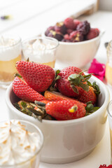 delicious and fresh strawberries in a bowl, citrus fruits, texture detail in wallpaper, studio