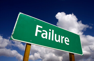 Failure Green Road Sign Under Cloudy Blue Skies