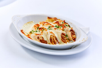 Cannelloni pasta with filling of ground beef, tomatoes
