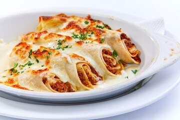 Cannelloni pasta with filling of ground beef, tomatoes