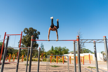 sportsman doing outdoor gymnastics, athlete, calisthenics