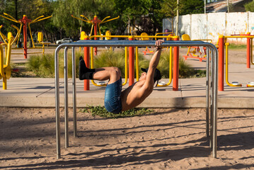 sportsman doing outdoor gymnastics, athlete, calisthenics