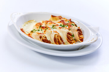 Cannelloni pasta with filling of ground beef, tomatoes