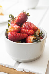 bowl with fresh red berries, healthy food and ingredient, delicious in studio, details of the texture