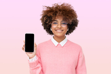 African girl in glasses holding smartphone with blank screen with copy space, showing it to viewer