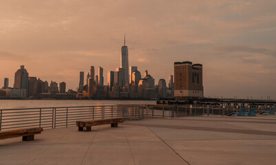 city skyline at sunset views New York downtown river 