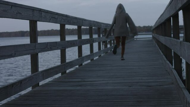 Young Woman Enjoys Sights on Dock at Reelfoot Lake State Park 4K