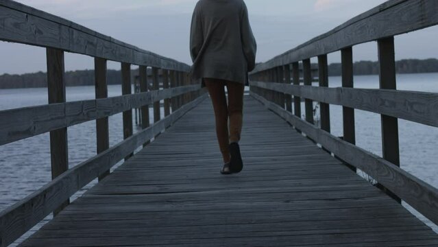 Young Woman Enjoys Sights on Dock at Reelfoot Lake State Park 4K