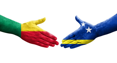 Handshake between Benin and Curacao flags painted on hands, isolated transparent image.