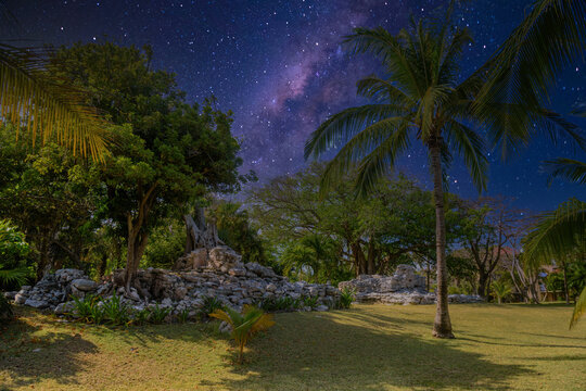 Playacar Mayan ruins in the forest park with Milky Way Galaxy stars night sky in Playa del Carmen, Yucatan, Mexico