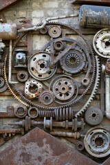 Fototapeta na wymiar old rusty gear wheels, heavy industry