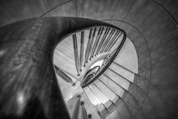 black and white staircase down to ground