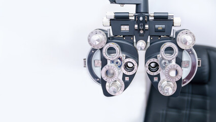 Phoropter eyesight measurement testing machine, Eye health check and ophthalmology concept. Web banner size. Copy space.