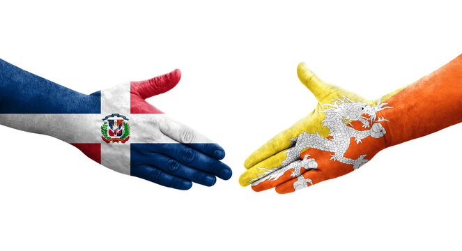 Handshake between Bhutan and Dominican Republic flags painted on hands, isolated transparent image.
