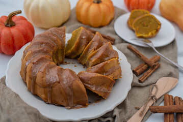 Fresh home made pumpkin bundt cake with cinnamon frosting