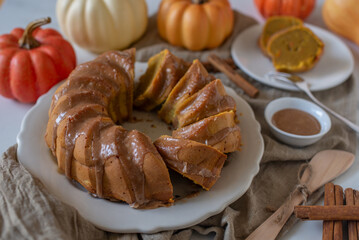 Fresh home made pumpkin bundt cake with cinnamon frosting