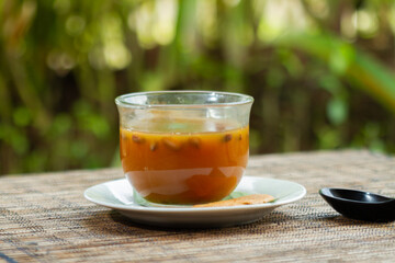 Wedang Ronde is a chewy round cake filled with caramelized peanuts and hot ginger drink or  Central Javanese palm sugar syrup.