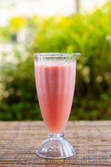 strawberry smoothie on the table