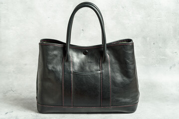 I took a picture of a leather tote bag.