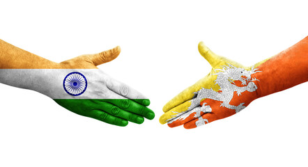 Handshake between Bhutan and India flags painted on hands, isolated transparent image.
