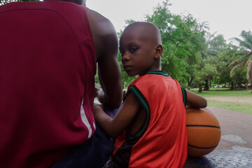 Father and son at the park with basketball