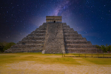 Fototapeta na wymiar Temple Pyramid of Kukulcan El Castillo with Milky Way Galaxy stars night sky, Chichen Itza, Yucatan, Mexico, Maya civilization