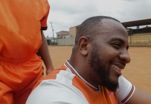 Father smiling at the soccer field