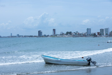 A boat sits on a beach at Boca Del Rio, Veracruz, Mexico.