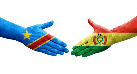 Handshake between Bolivia and Dr Congo flags painted on hands, isolated transparent image.