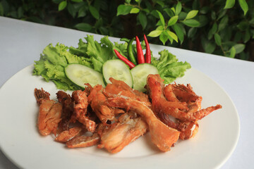 Orange Salmon Belly that has been fried and used to make food