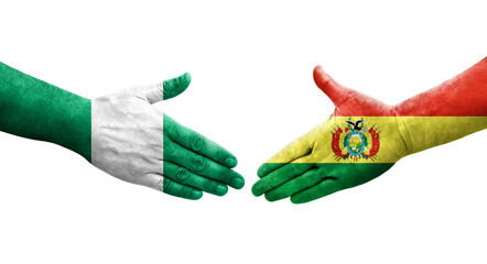 Handshake between Bolivia and Nigeria flags painted on hands, isolated transparent image.