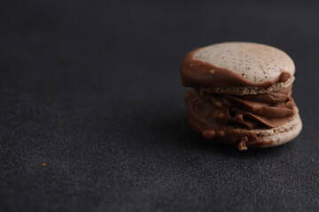 Macaroons in black background
