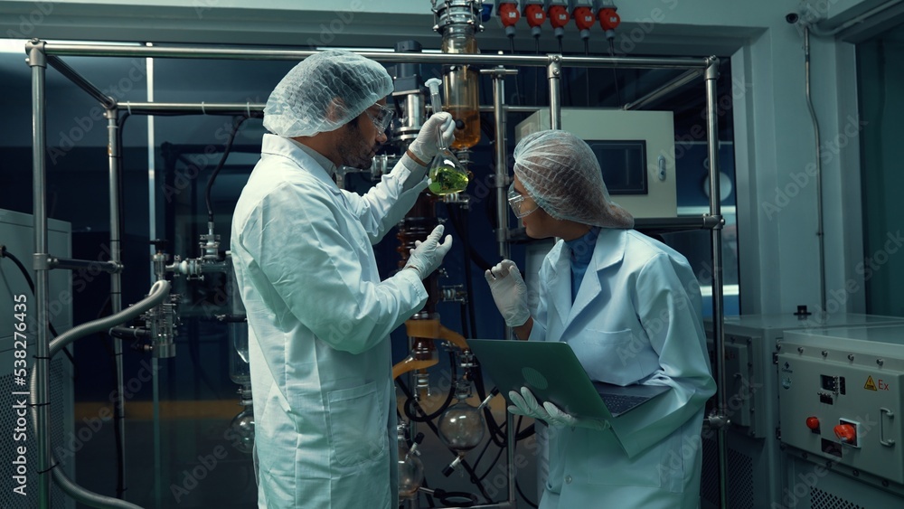 Poster two scientist in professional uniform working in laboratory for chemical and biomedical experiment