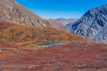 Mountain glacier lake. Picturesque hidden location in the mountains. Outdoors style vacation. Adventure travel in the wildlife, no people. Mountain valley landscape stock photo