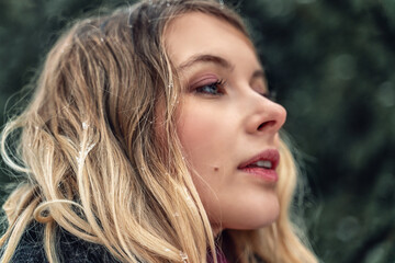 New Year's photos of a beautiful girl in the forest with a decorated Christmas tree, filled with...